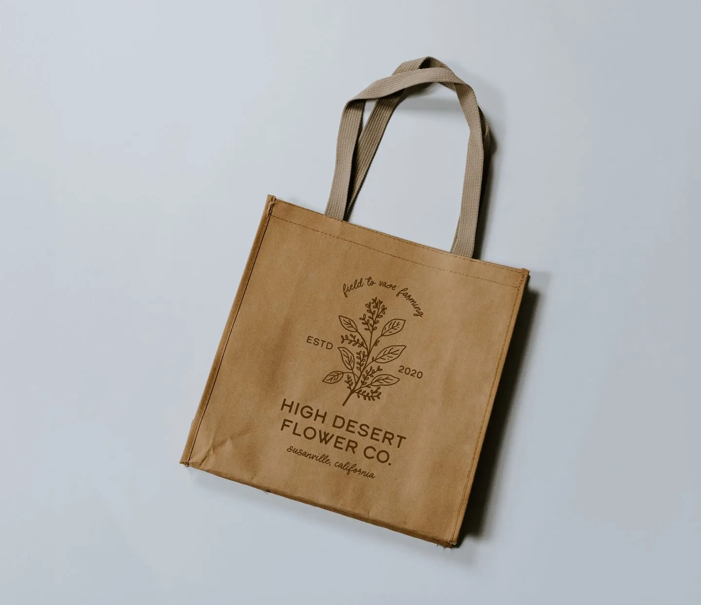 High Desert Flower Co. logo printed on a kraft tote bag