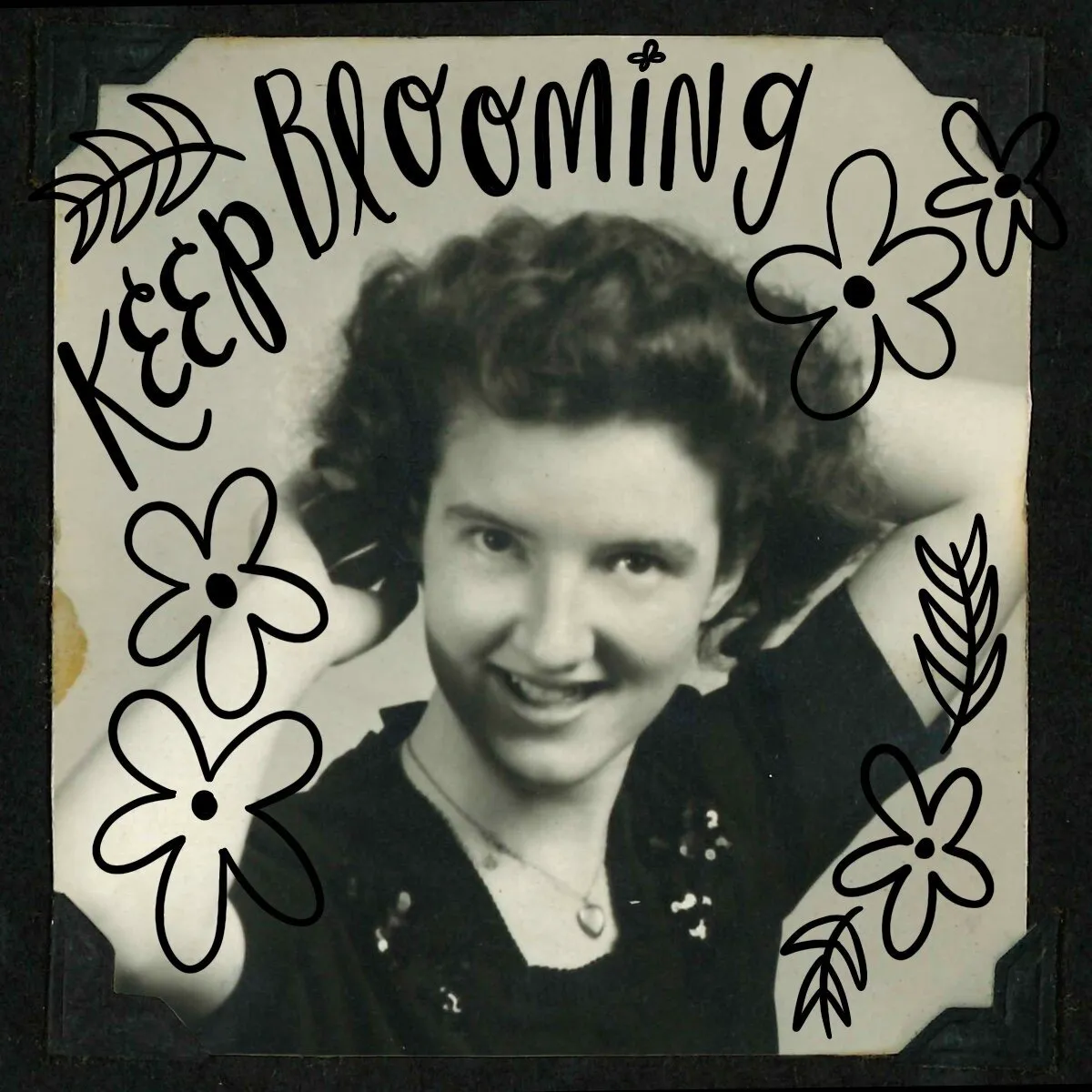 'Keep Blooming' hand lettered with flowers over a vintage portrait