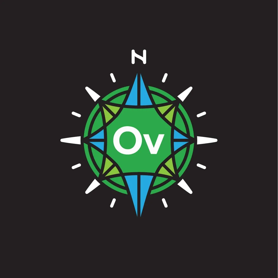 OV compass-rose logo in green and blue on black