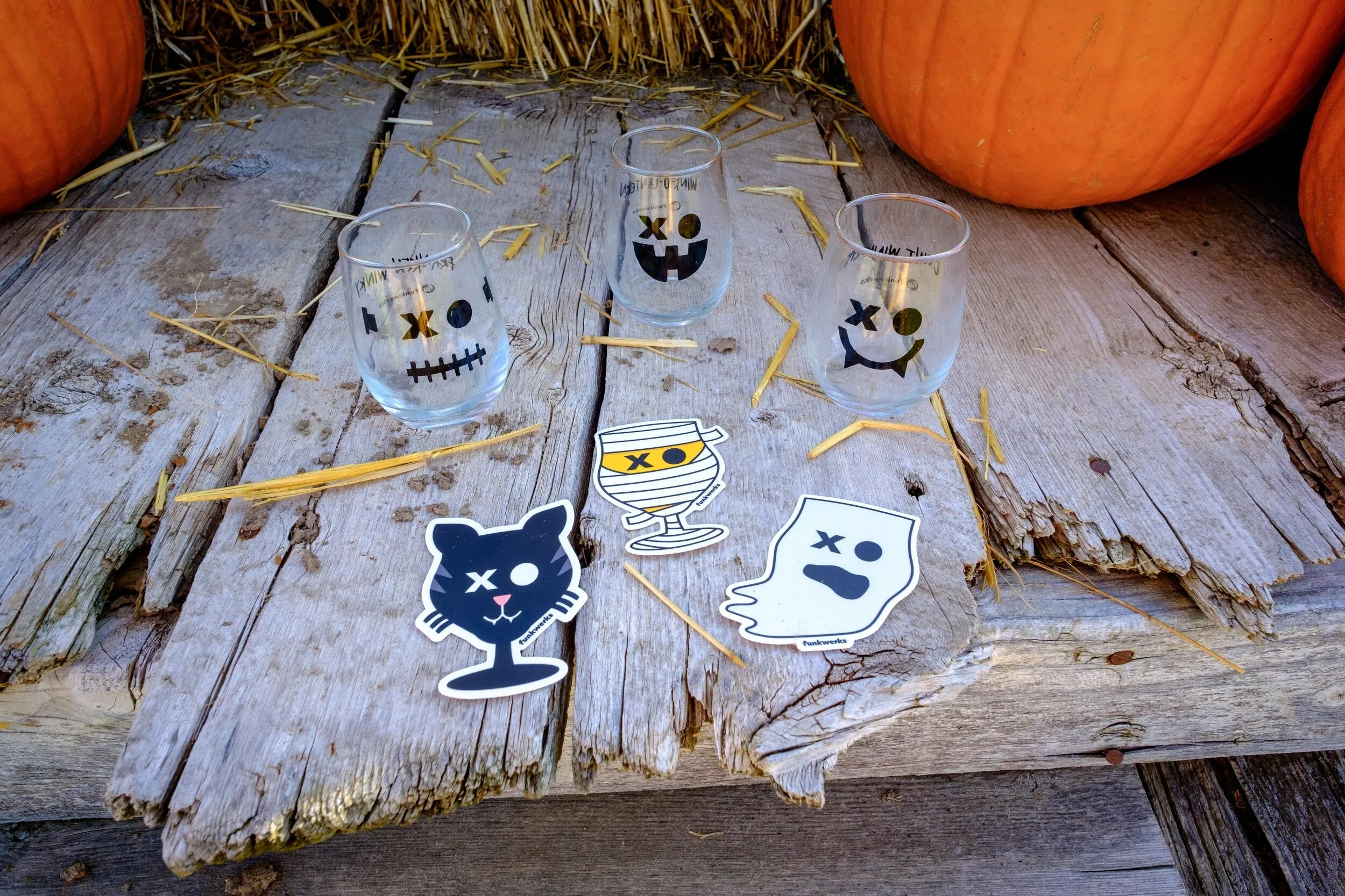 Nightmare on Funk Street Halloween stickers on a hay bale