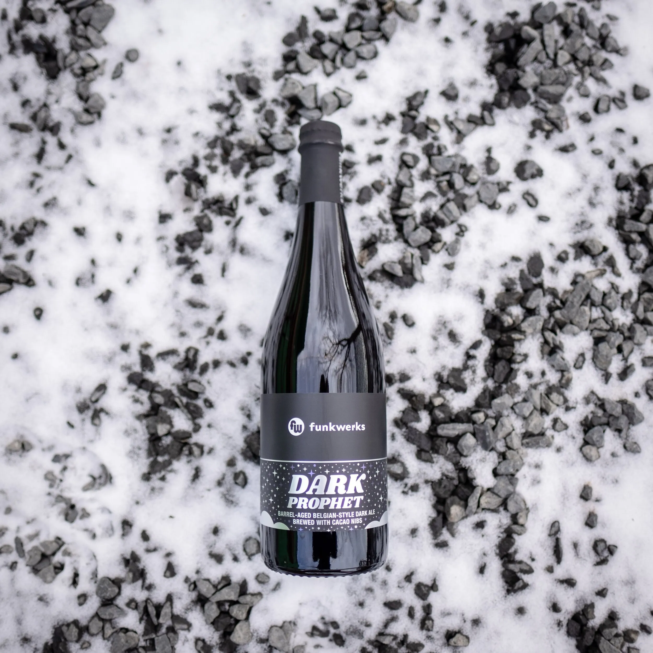 Dark Prophet bottle lying in snow