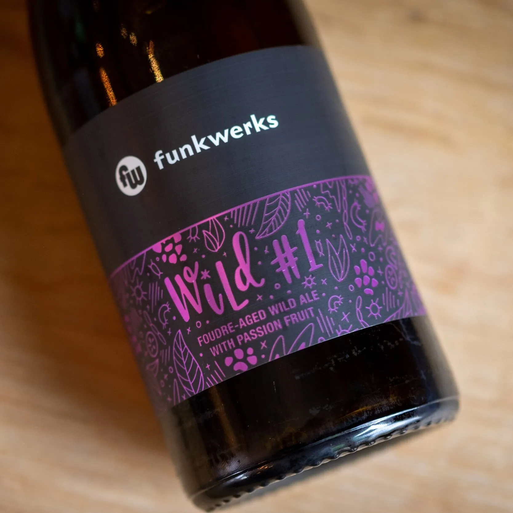 Wild #1 bottle with purple floral label